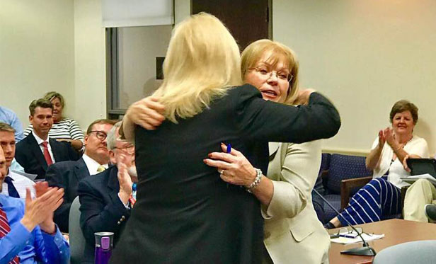 To 'make Sam proud': Ann Granato sworn in to fill late husband's spot on the Salt Lake County Council
