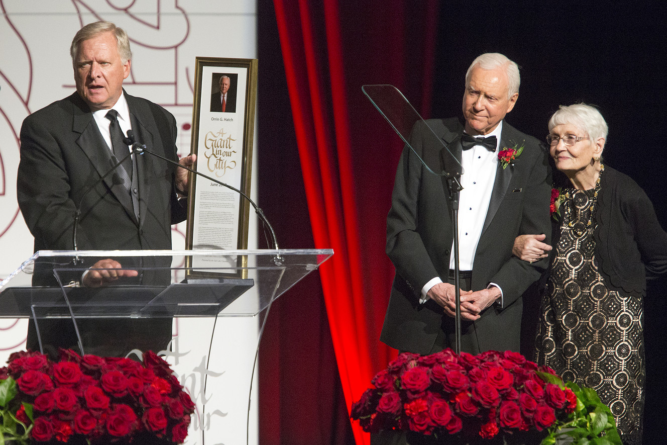 Wilford Clyde, CEO of Clyde Companies, presents a plaque to Sen. Orrin Hatch, R-Utah, and his wife Elaine Hatch, naming him the 39th Giant in Our City at the Grand America Hotel in Salt Lake City on Saturday, June 9, 2018. The Salt Lake Chamber, Utah's largest business association, gives the award to honor outstanding professional achievement and public service. (Photo: James Wooldridge, KSL)