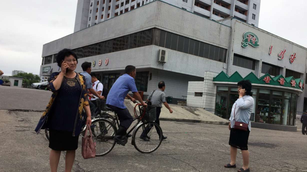 In eye of storm, North Koreans sees scant news of Kim's trip