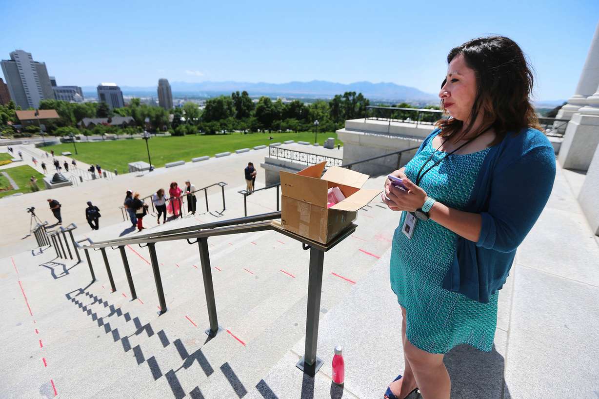 Rep. Angela Romero, D-Salt Lake City, in partnership with the National Foundation for Women Legislators, the Junior League of Salt Lake City, Backyard Broadcast and the Utah Attorney General's Office, helps raise awareness on National Children's Day about Utah efforts to combat human trafficking on Sunday, June 10, 2018. (Photo: Scott G Winterton, KSL)