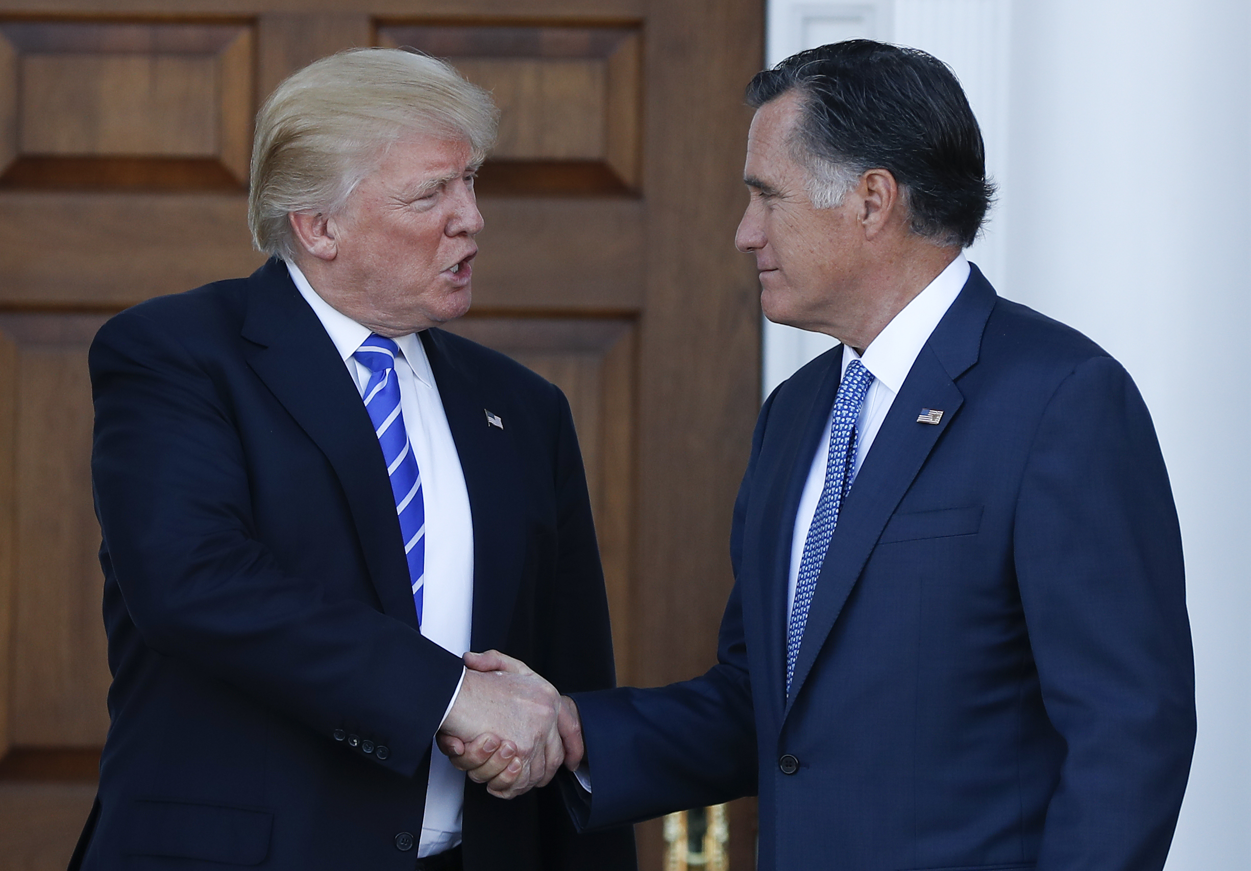 Now a candidate, Romney appears to embrace Trump presidency