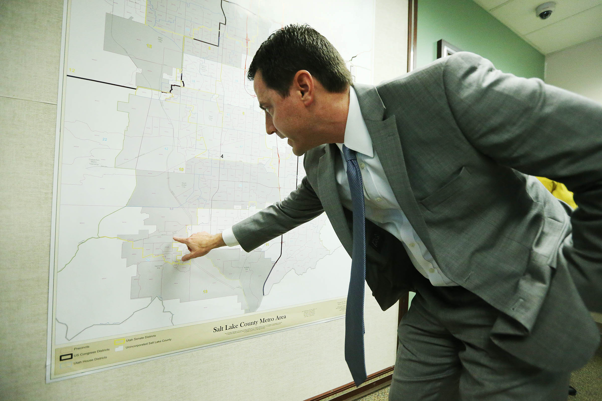 Riverton Mayor Trent Staggs, points out the location of the proposed 8,800-unit Olympia development on a map at the Salt Lake County Clerk's Office in Salt Lake City on Monday, June 11, 2018. (Photo: Scott G. Winterton, KSL)