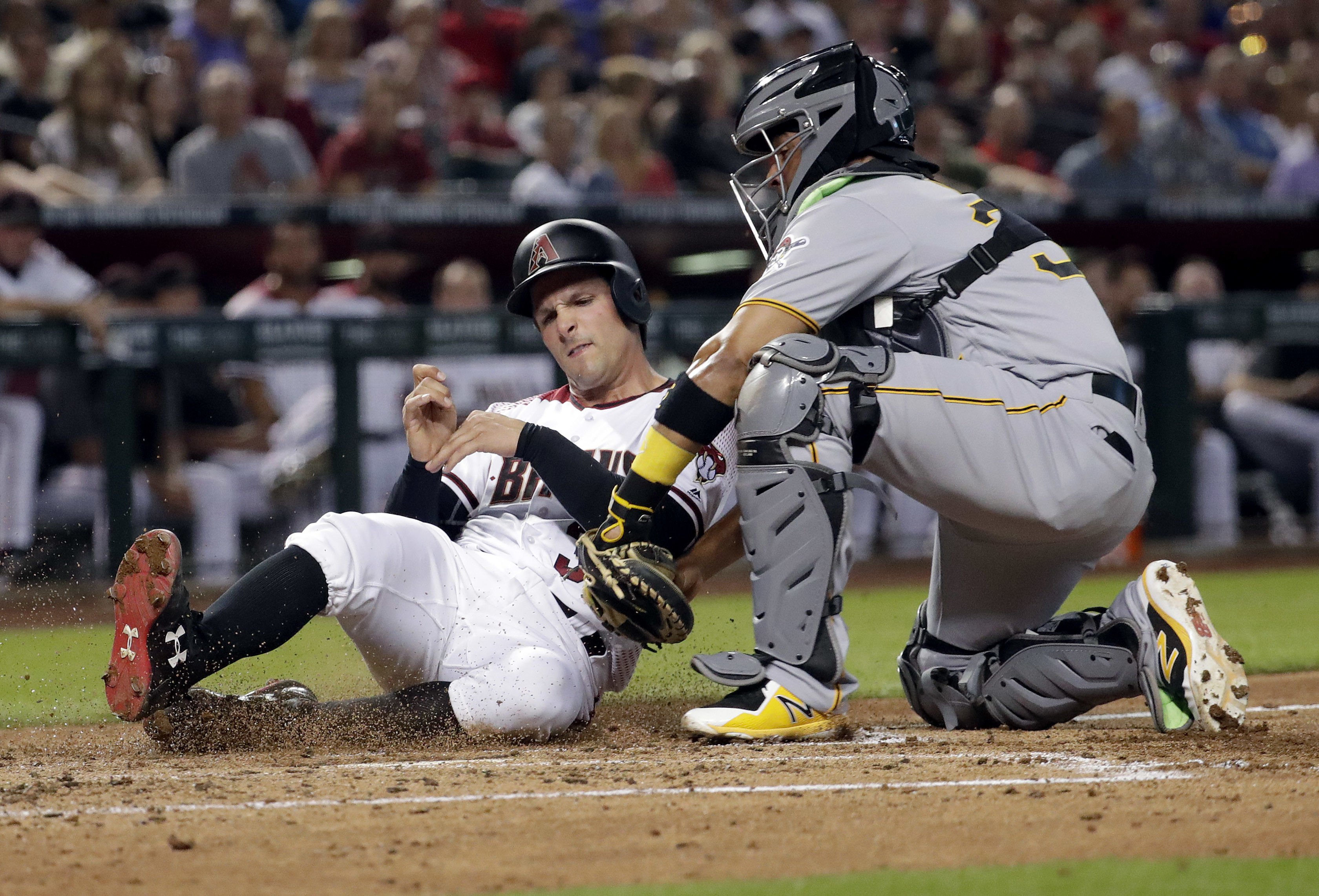 Diamondbacks score on late wild pitches to beat Pirates 9-5