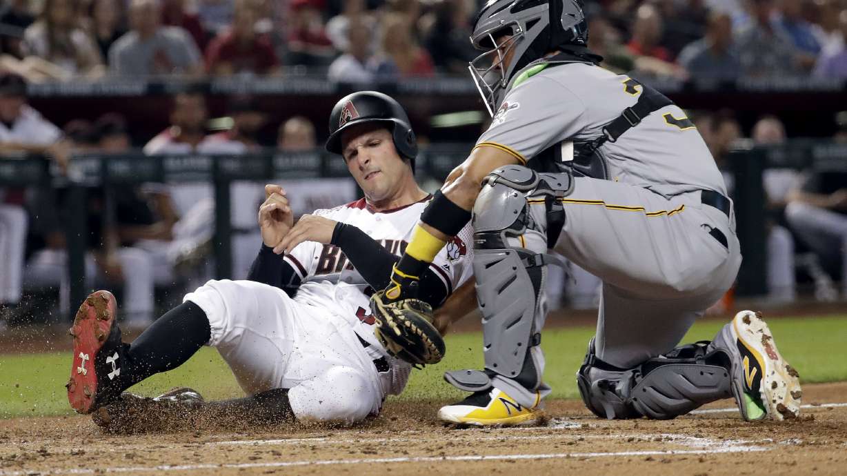 Diamondbacks score on late wild pitches to beat Pirates 9-5