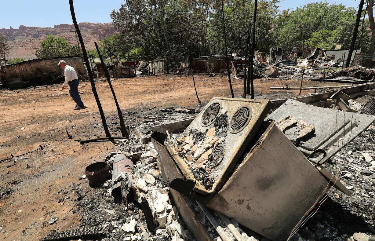 Remains of a fire that destroyed eight homes, two garages and a shop near Pack Creek in Moab on Wednesday, June 13, 2018. (Photo: Jeffrey D. Allred, KSL)