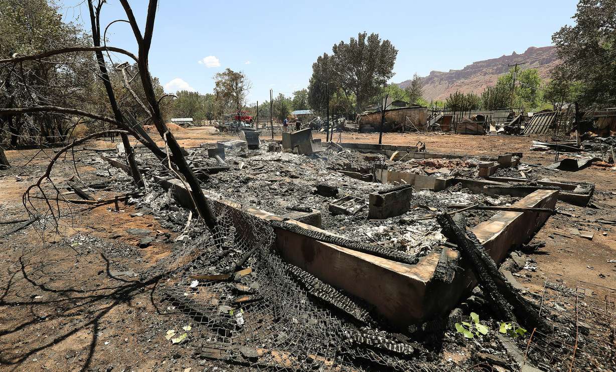Remains of a fire that destroyed eight homes, two garages and a shop near Pack Creek in Moab on Wednesday, June 13, 2018. (Photo: Jeffrey D. Allred, KSL)