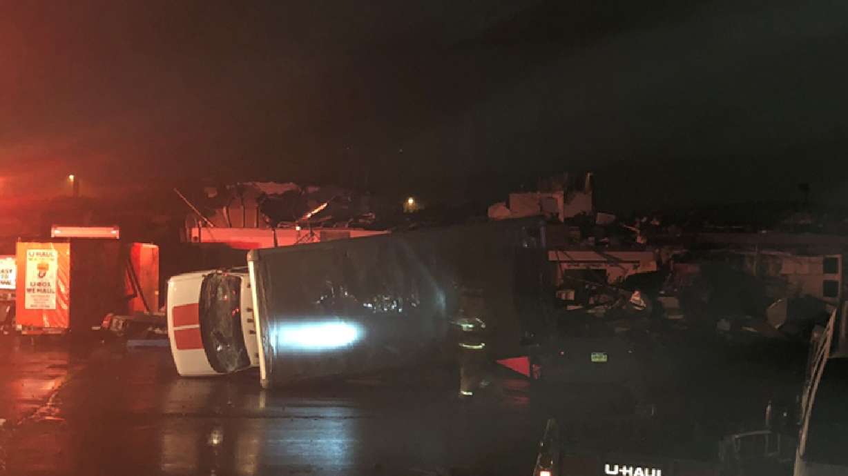 The Latest: 2 tornadoes confirmed with speeds of 111-135 mph