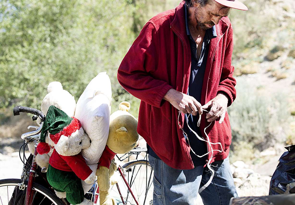 Richard Smith packs up what he can carry during a cleanup of homeless camps located east of Victory Road in the foothills north of Salt Lake City on Thursday, June 14, 2018. Smith has been living in the Victory Road area for nine years. (Photo: Laura Seitz, KSL)