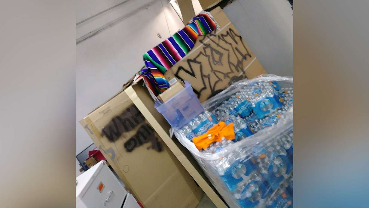 A photo included as an exhibit in a lawsuit filed on Monday, June 11, 2018, by a former Vivint Solar employee in California shows what the plaintiff alleges to be a cardboard "fort" built by co-workers in a workspace and spray-painted with the phrase "white only." (Photo: Matern Law Group PC)