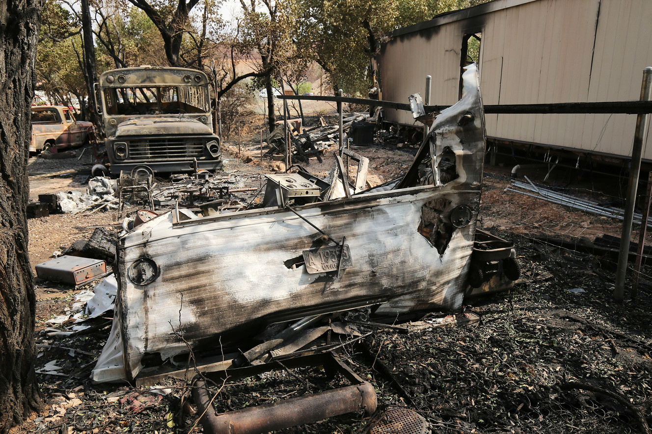 Burned-out vehicles are pictured on Thursday, June 14, 2018, in Moab. A fire on Tuesday destroyed several homes. (Photo: Jeffrey D. Allred, KSL)