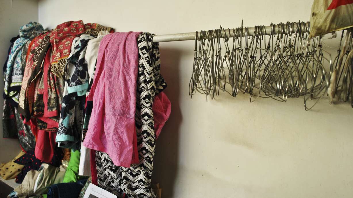 AP PHOTOS: Inside the changing world of a Pakistani tailor