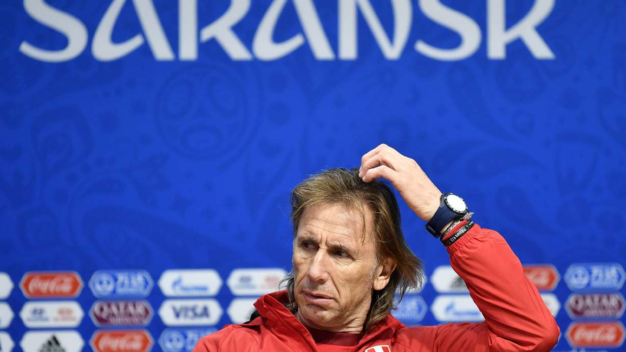 The Latest: Ronaldo 3, Spain 3: Star's hat trick earns draw