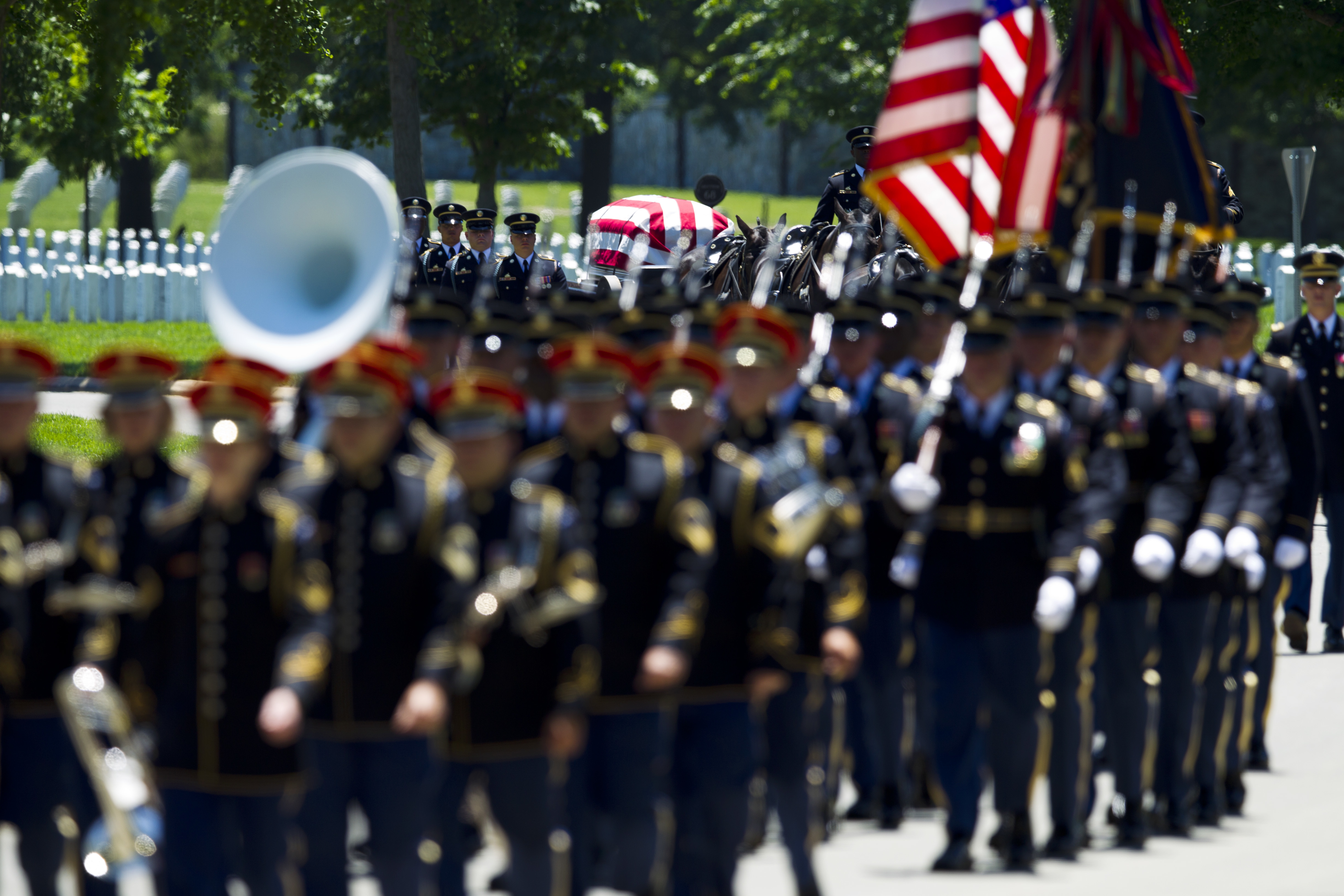 The Latest: WWII pilot missing since 1944 crash buried