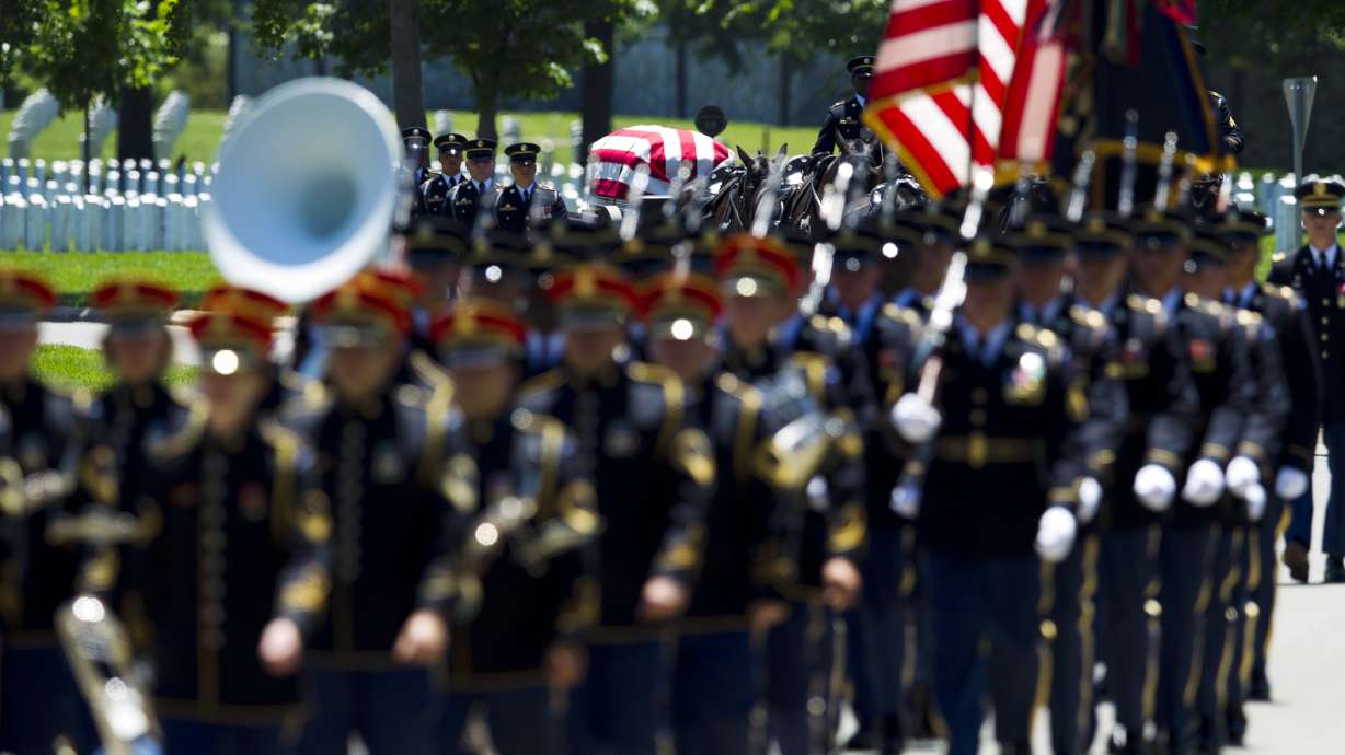 The Latest: WWII pilot missing since 1944 crash buried