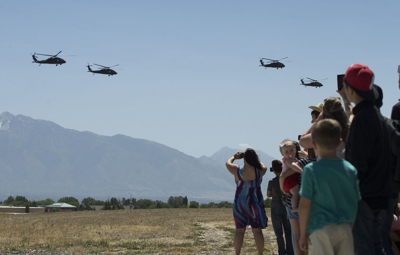 Family members and friends watch as more than 230 soldiers from one of the Utah National Guard's aviation units deploy to the Middle East in support of Operation Spartan Shield from the Army Aviation Support Facility in West Jordan on Friday, June 15, 2018. (Photo: Laura Seitz, KSL)