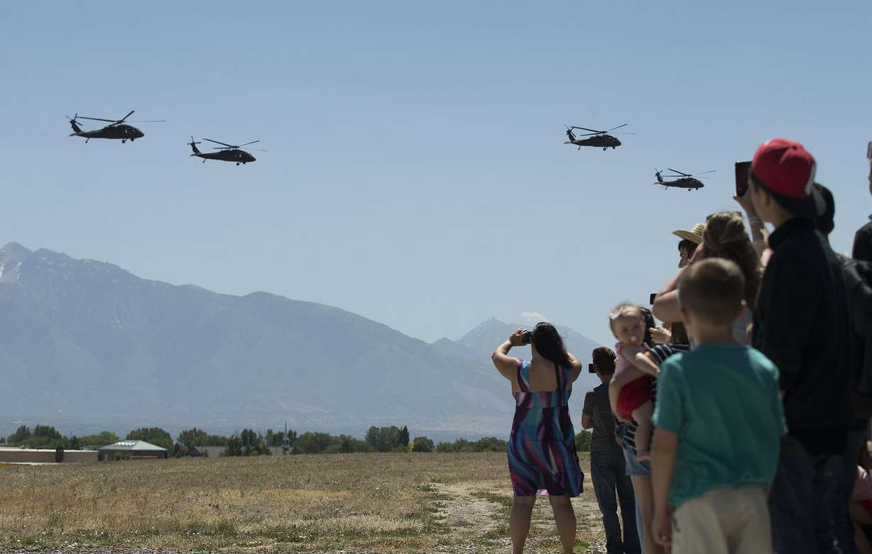 Family members and friends watch as more than 230 soldiers from one of the Utah National Guard's aviation units deploy to the Middle East in support of Operation Spartan Shield from the Army Aviation Support Facility in West Jordan on Friday, June 15, 2018. (Photo: Laura Seitz, KSL)