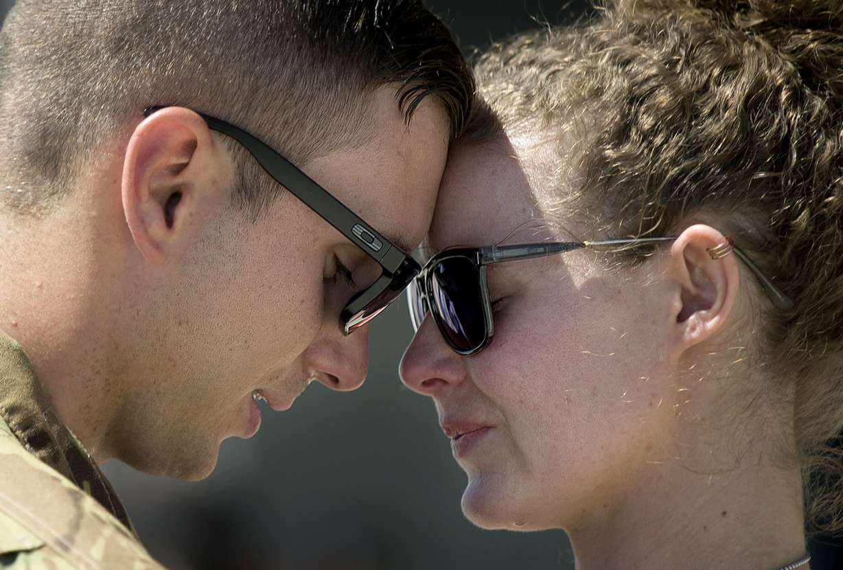 Sgt. Brady Valdez says goodbye to his girlfriend Kara Blodgett, of Sandy, as more than 230 soldiers from one of the Utah National Guard's aviation units deploy to the Middle East in support of Operation Spartan Shield from the Army Aviation Support Facility in West Jordan on Friday, June 15, 2018. (Photo: Laura Seitz, KSL)