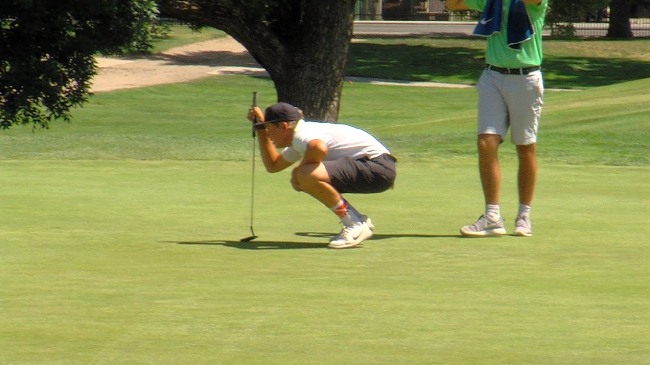 15-year-old Preston Summerhays lines up a during the 2018 Utah State Amateur, when he won a semifinal, 1 up over Jayce Frampton of Dixie State, Friday, June 15, 2018 at Oakridge Country Club in Farmington. (Photo: Hema Heimuli, Jr., KSL TV)