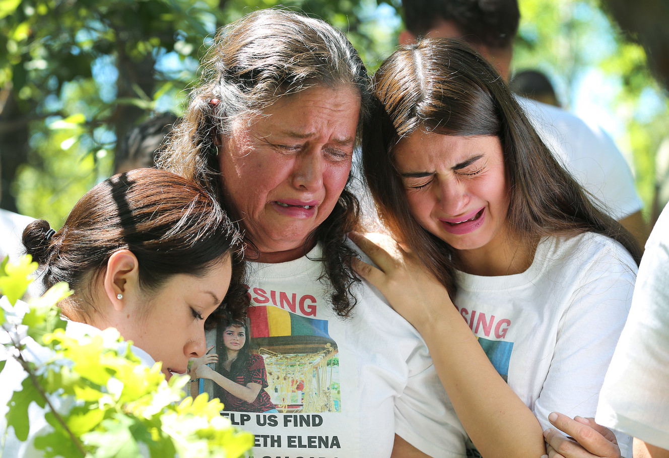 Libertad Edith Salgado Figueroa, mother of Elizabeth Elena Laguna Salgado, cries with her sisters, Ruth Yolanda Laguna Salgado and Mayra Ivette Salgado, as family members gather in Hobble Creek Canyon on Friday, June 15, 2018, where her body was found and leave a memorial. (Photo: Jeffrey D. Allred, KSL)