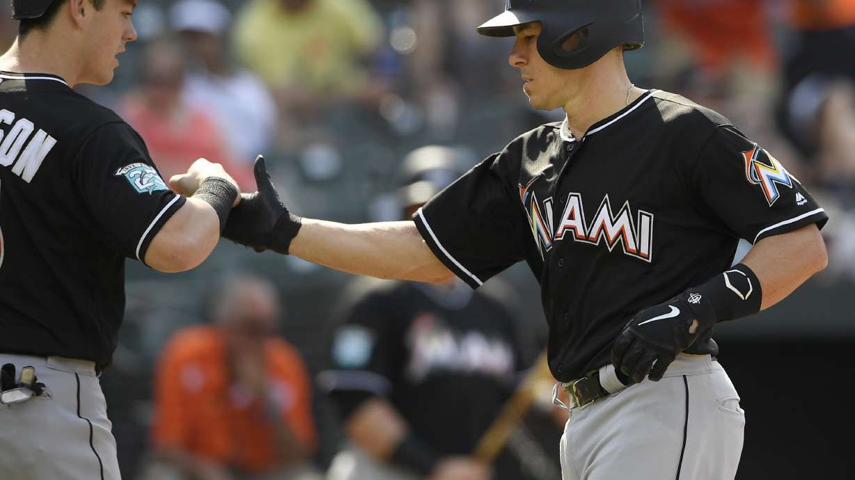 Realmuto has 2 HRs, 4 RBIs; Marlins sink Orioles 5-4