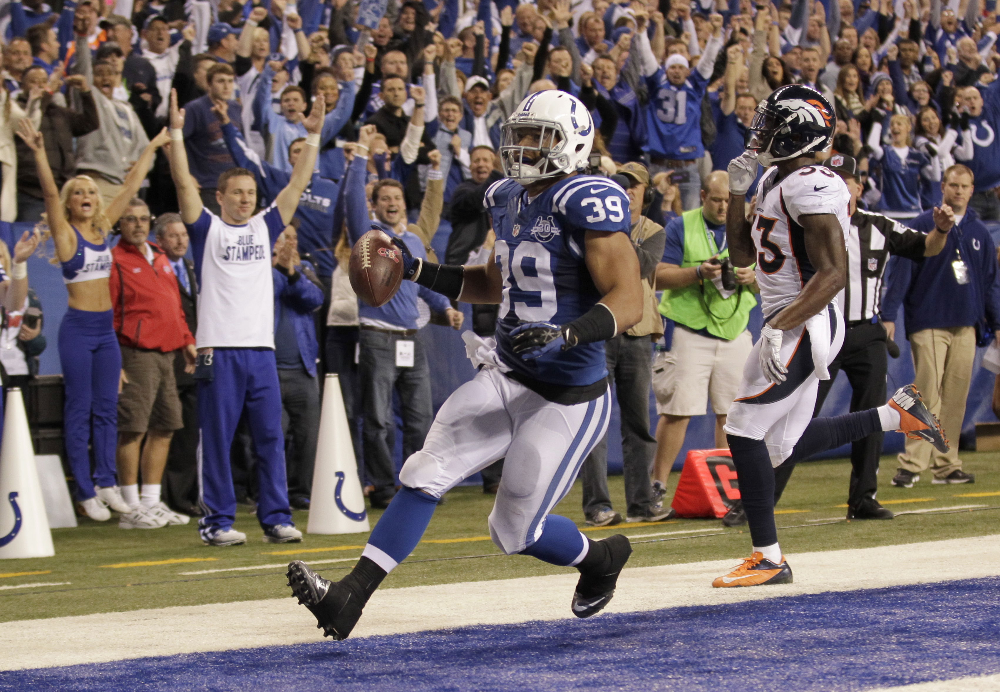 Indianapolis Colts fullback Stanley Havili (39) celebrates his touchdown during the first half of an NFL football game against the Denver Broncos, Sunday, Oct. 20, 2013, in Indianapolis. (Photo: AJ Mast, AP)