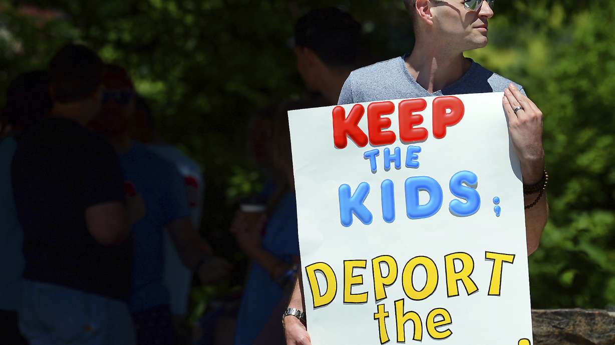 The Latest: Microsoft criticized for Immigration agency work