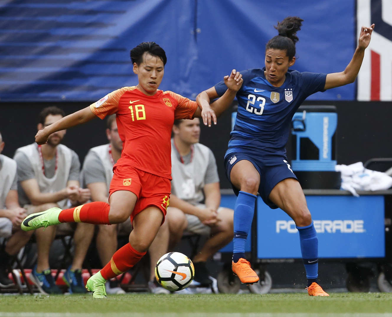 China's Han Peng (18) and United States' Christen Press (23) vie for the ball during the first half during an international friendly soccer match Tuesday, June 12, 2018, in Cleveland. The United States defeated China 2-1. (Photo: Ron Schwane, AP)