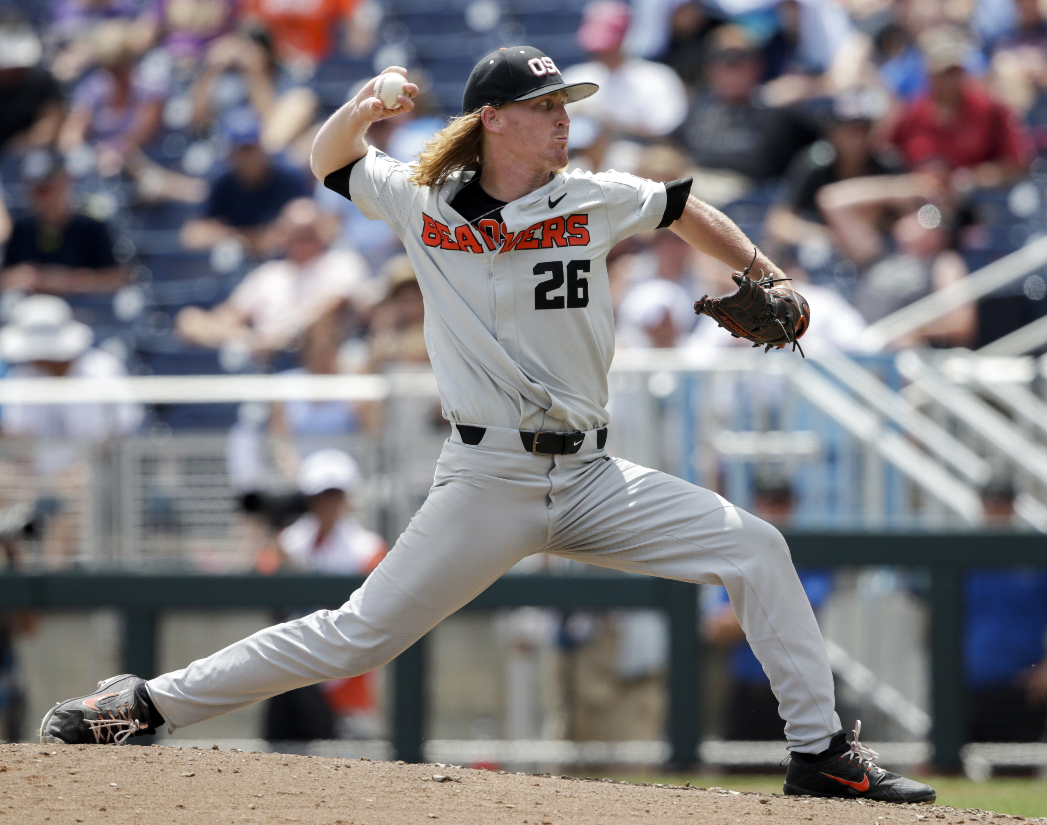 Oregon St. rallies after delay to beat Huskies 14-5 at CWS