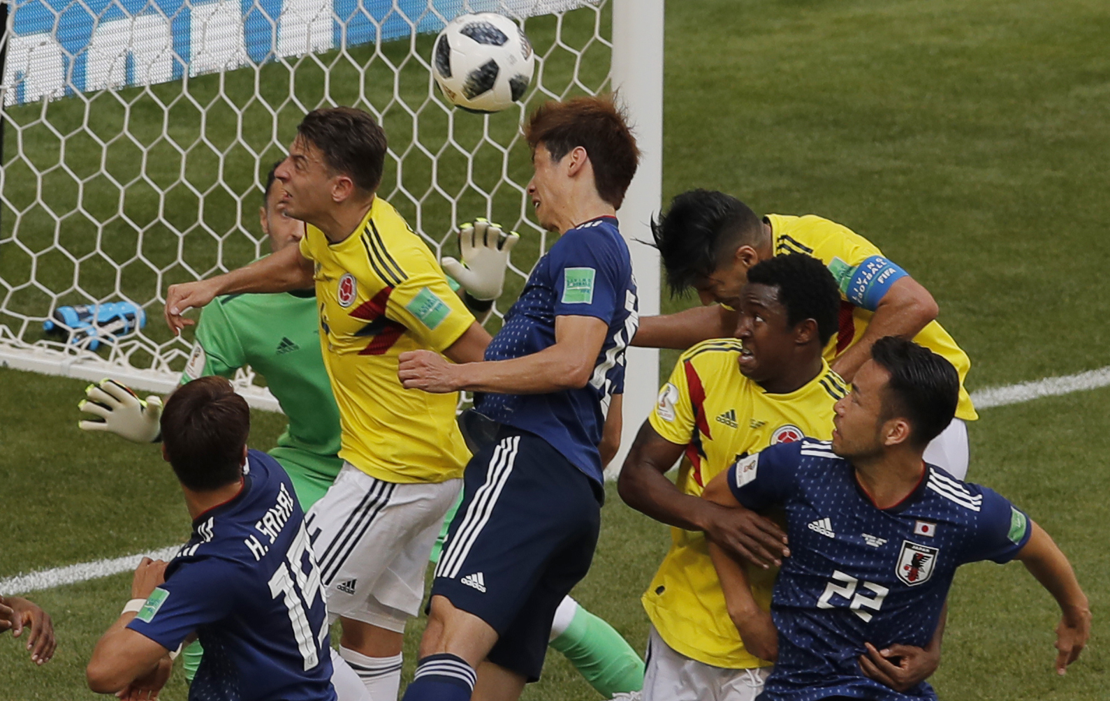 Early penalty helps Japan beat Colombia 2-1 at World Cup
