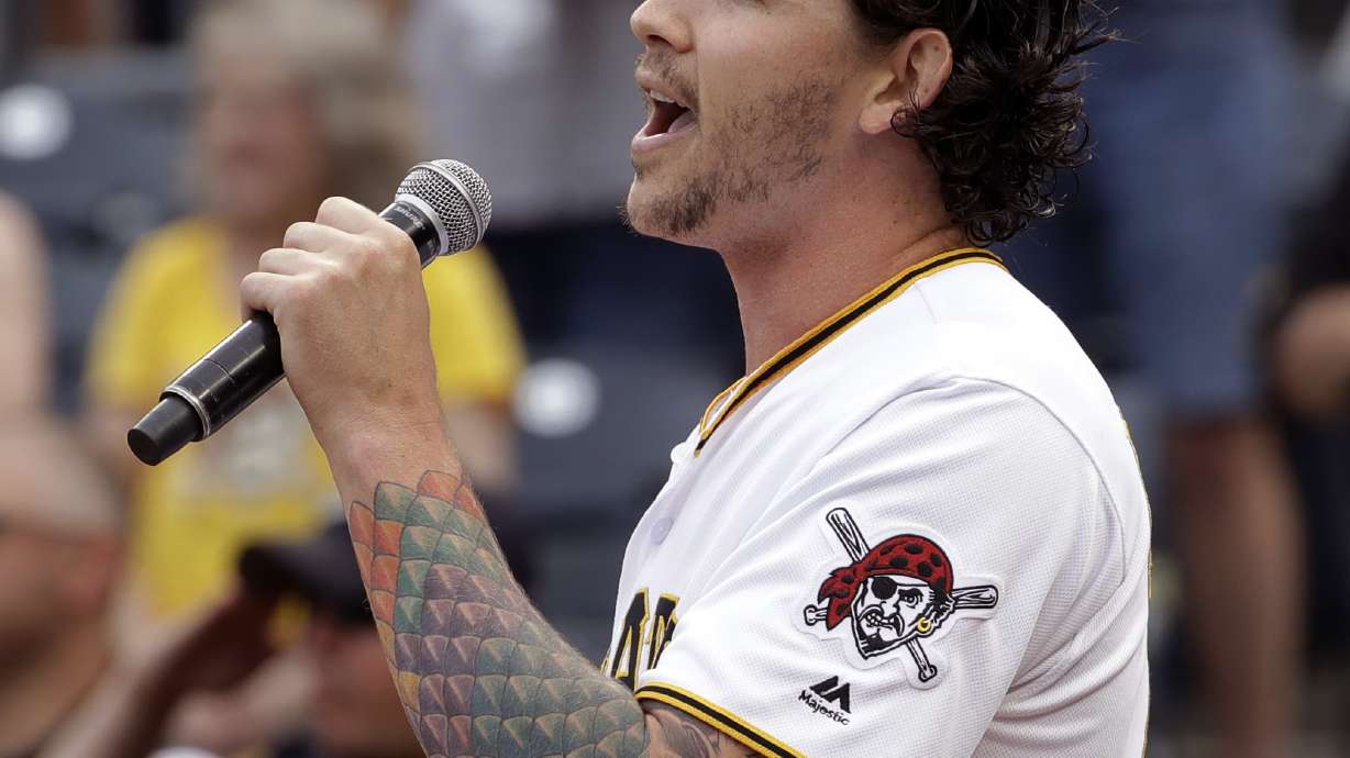 Rookie Peralta leads Brewers by Pirates 3-2