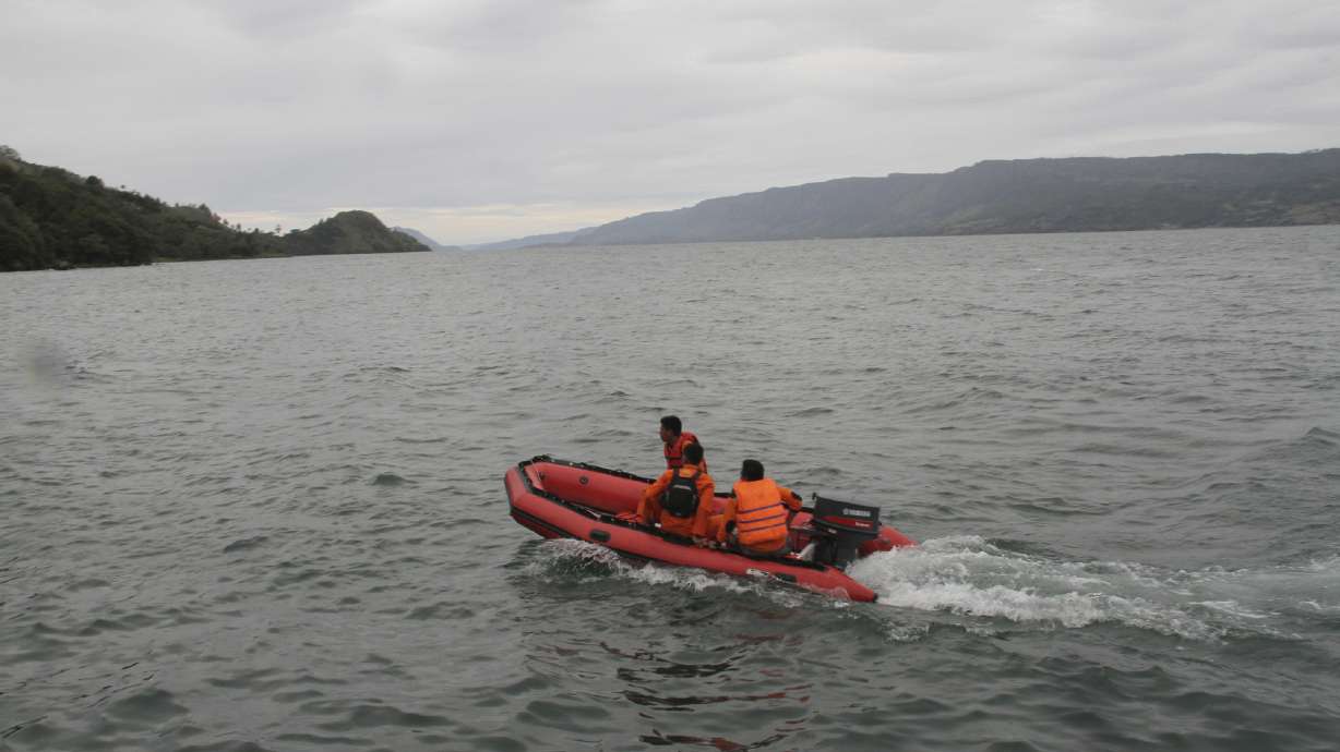 Divers search Indonesian lake for 192 missing after sinking