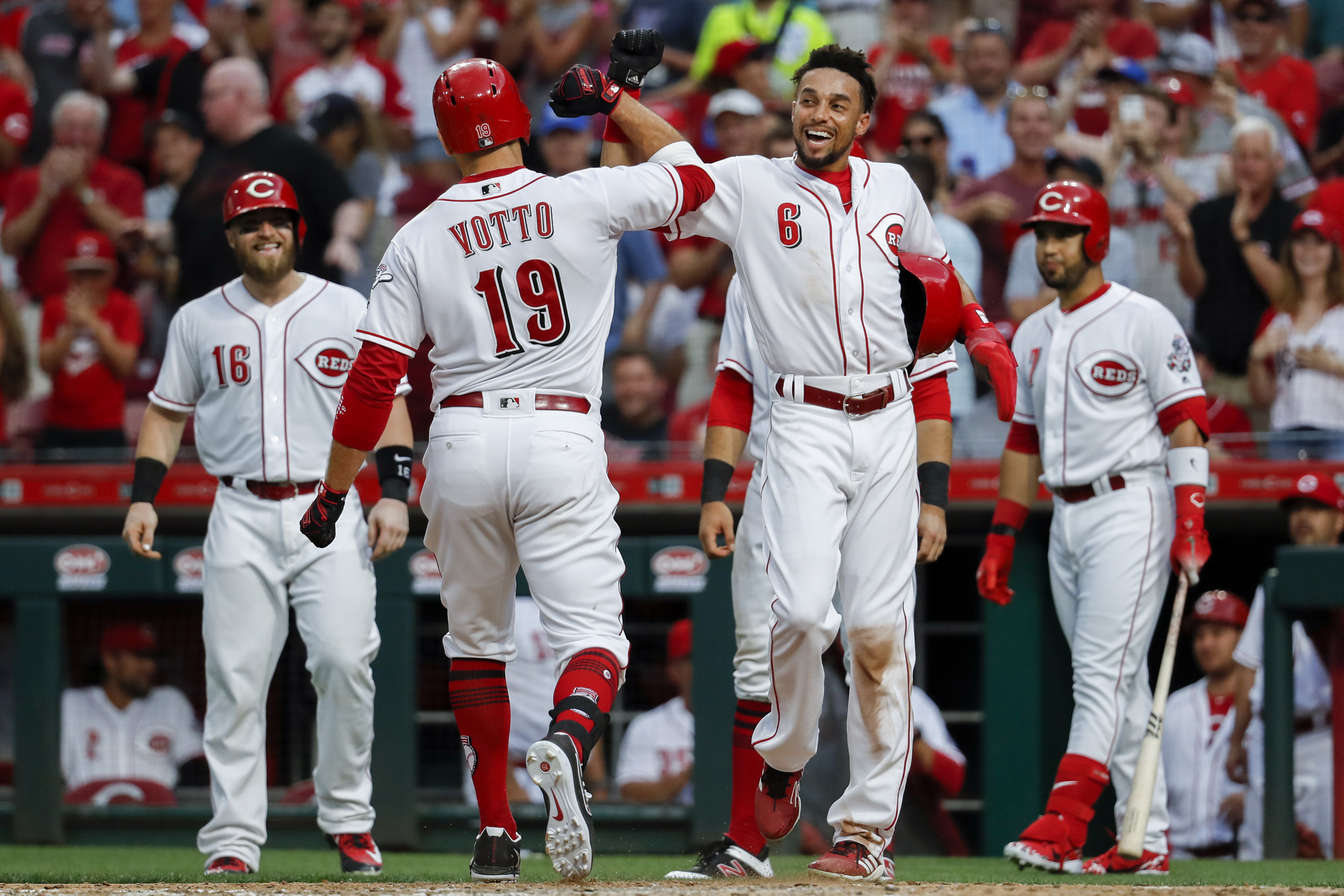 Votto breaks drought with grand slam as Reds beat Tigers 9-5