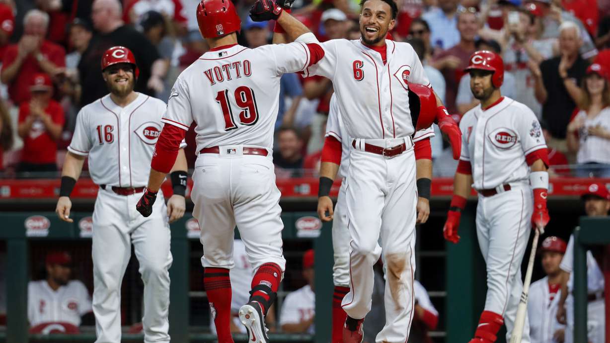 Votto breaks drought with grand slam as Reds beat Tigers 9-5