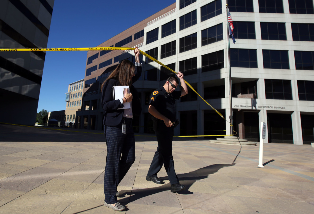 Salt Lake police work at the scene of a fatal shooting between the Heber M. Wells Building and the Olene S. Walker Building in downtown Salt Lake City on Wednesday, June 20, 2018. (Photo: Kristin Murphy, KSL)