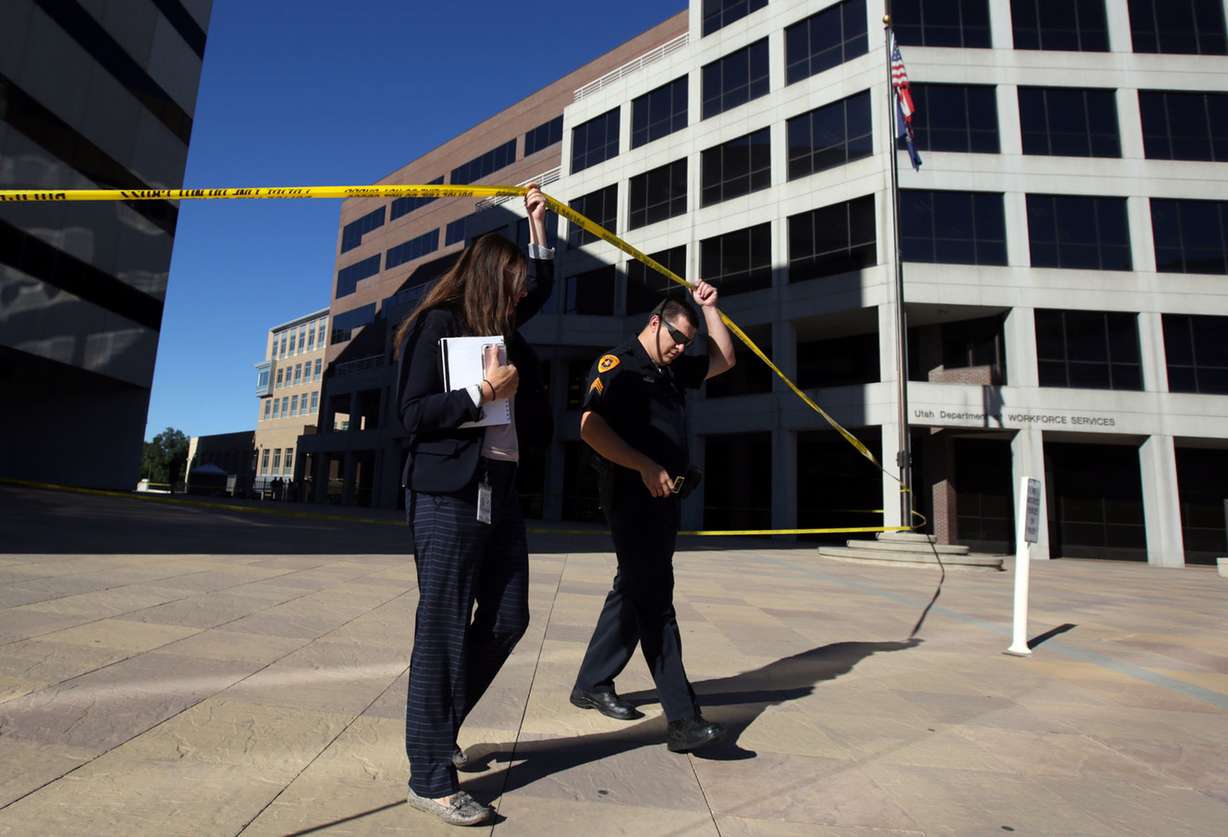 Salt Lake police work at the scene of a fatal shooting between the Heber M. Wells Building and the Olene S. Walker Building in downtown Salt Lake City on Wednesday, June 20, 2018. (Photo: Kristin Murphy, KSL)