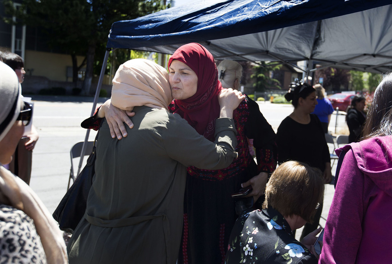 Maysa Kergaye greets Faten Ibrahim on World Refugee Day at MOSAIC Inter-Faith Ministries in Millcreek on Wednesday, June 20, 2018. (Photo: Laura Seitz, KSL)
