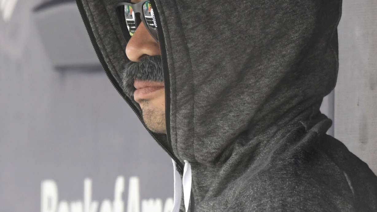 Ichi-who? Suzuki sits on M's bench in fake mustache disguise