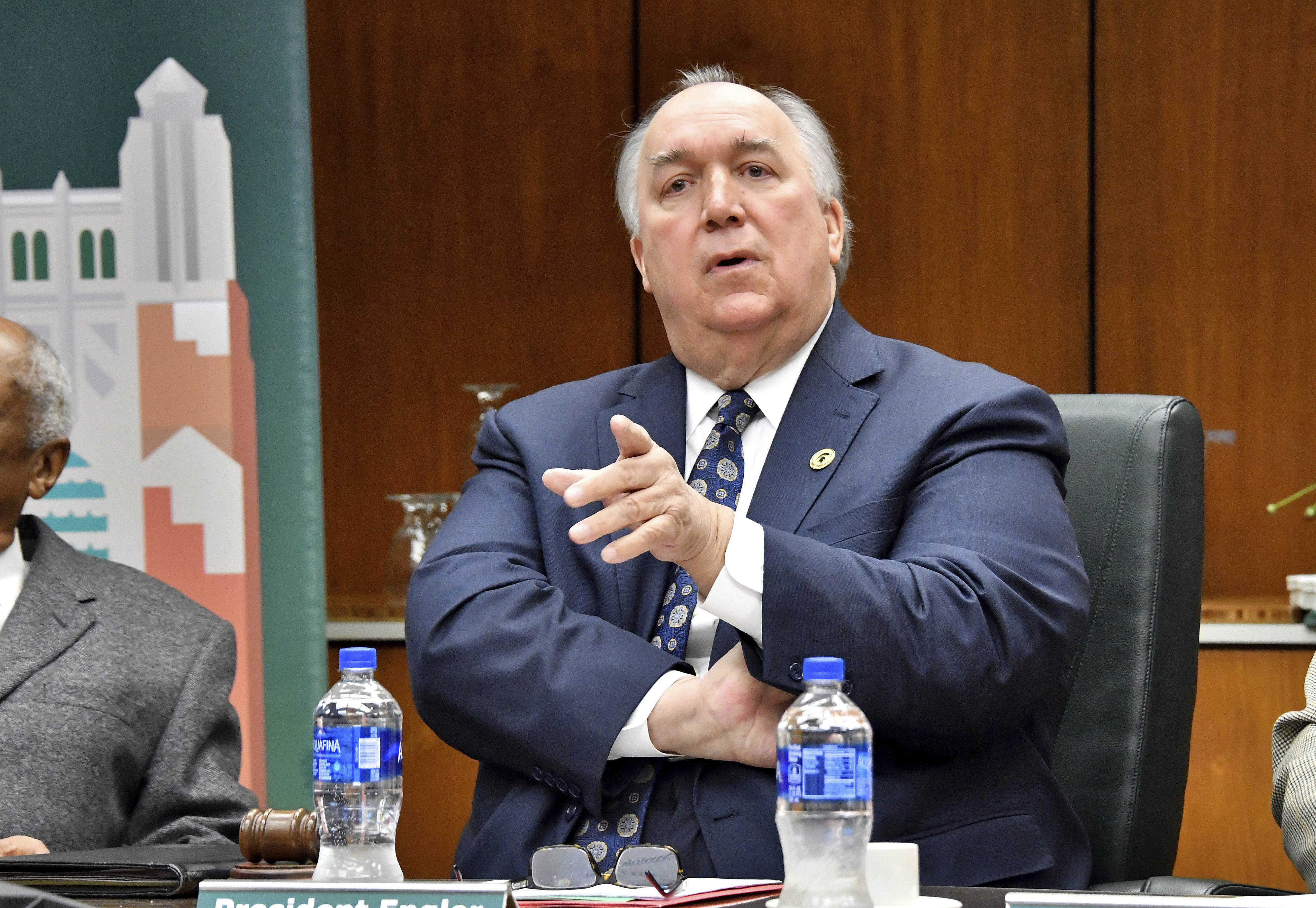 Michigan State keeps president, to issue $500 million bond