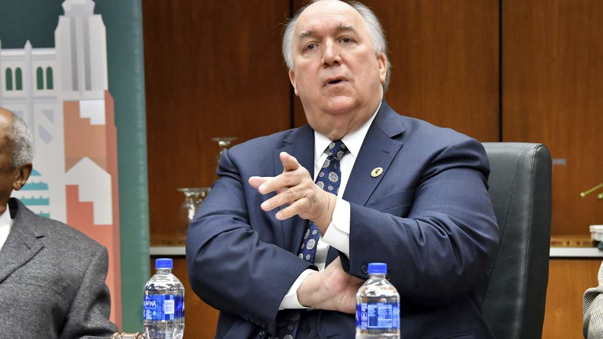 Michigan State keeps president, to issue $500 million bond