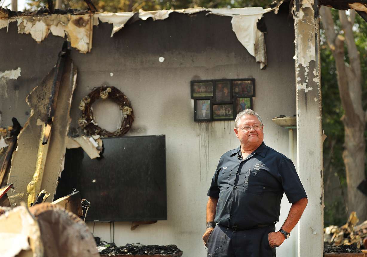 Rick Carrigan looks over the damage to his home on Thursday, June 14, 2018, after a fire on June 12 destroyed several houses in Moab. (Photo: Jeffrey D. Allred, KSL)