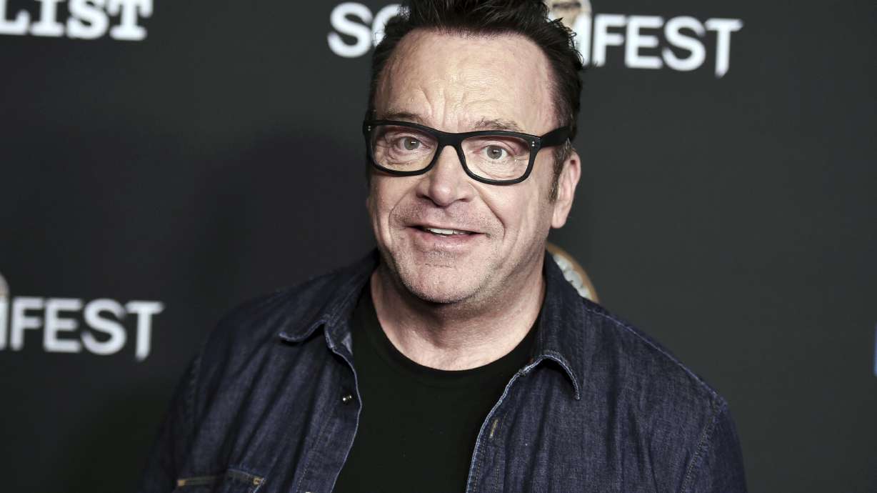 The Latest: Cohen denies discussing Trump with Tom Arnold