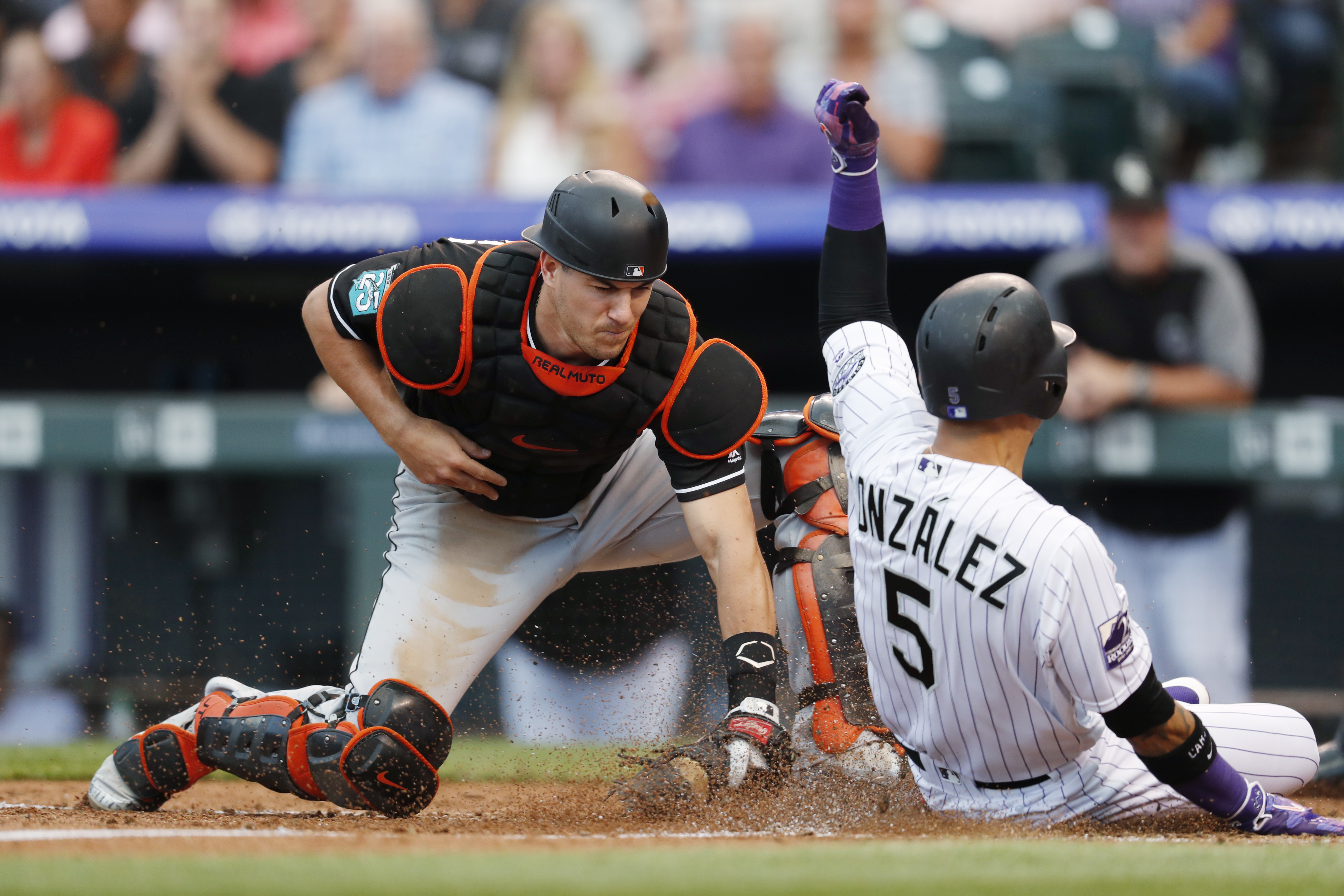 Gray strikes out 12 in Rockies' 11-3 win over Marlins