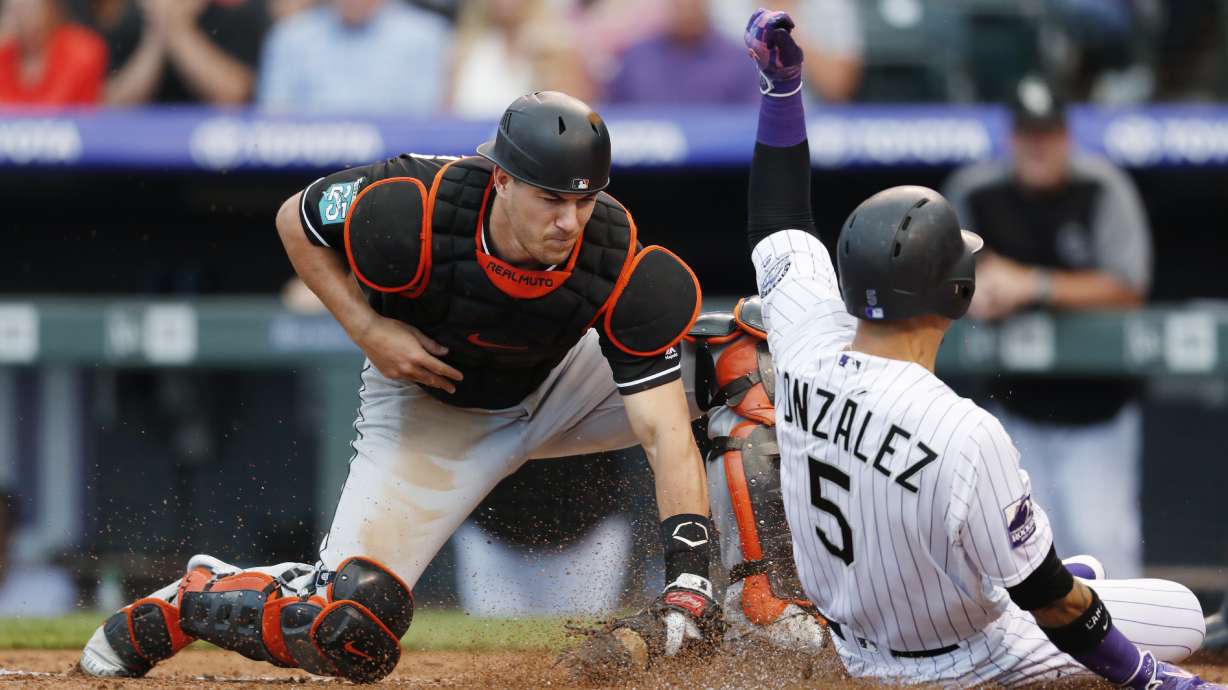 Gray strikes out 12 in Rockies' 11-3 win over Marlins