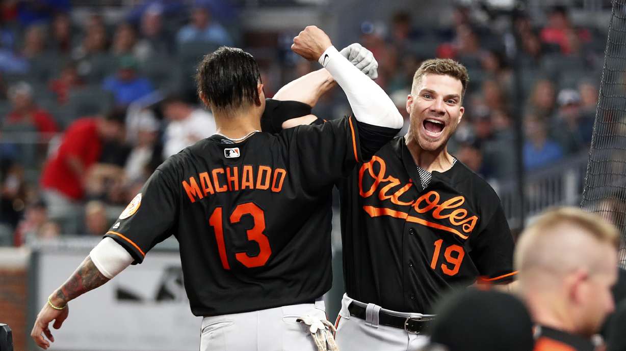 Machado hits 2-run HR in 15th as Orioles beat Braves 10-7