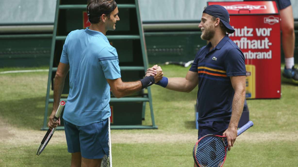 Federer chases 99th title, faces Coric in Halle final