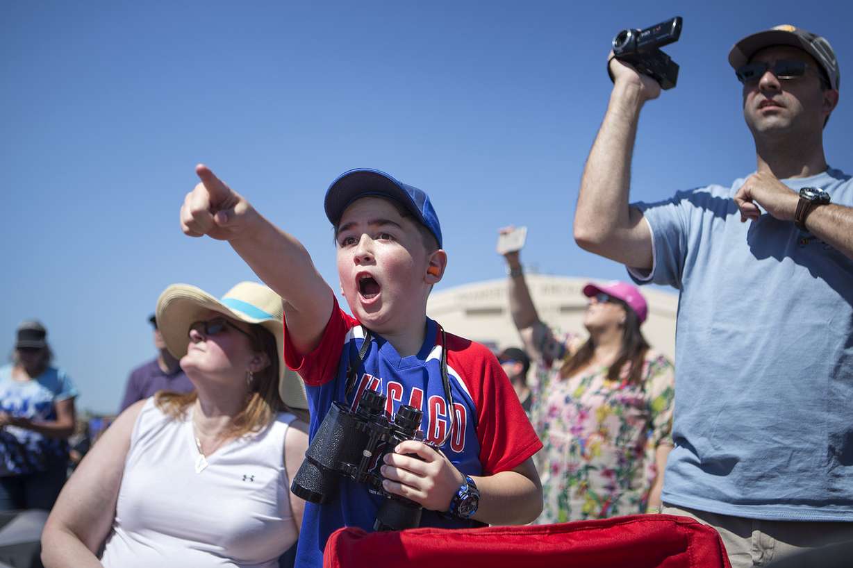 Gavry Strelka, 9, watches the 388th Fighter Wing Attack Demo streak by in F-35As during the Warriors Over the Wasatch Air and Space Show at Hill Air Force Base on Saturday, June 23, 2018. Watching behind him are Mark and Carrie Strelka. (Photo: James Wooldridge, KSL)