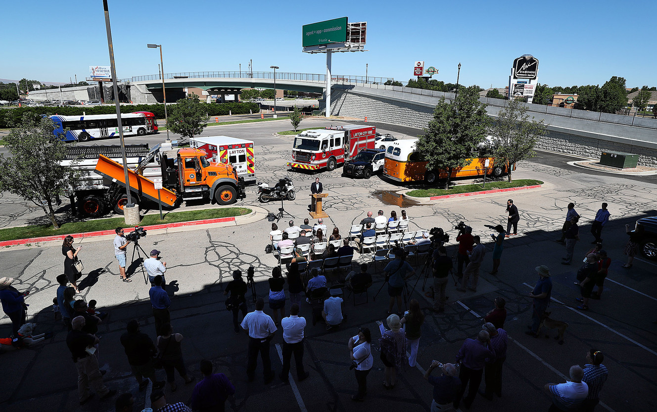 Layton Mayor Bob Stevenson speaks as UDOT and Layton City open the Midtown Crossing bridge over I-15 in Layton on Monday, June 25, 2018. The bridge is seen in the background. (Photo: Ravell Call, KSL)