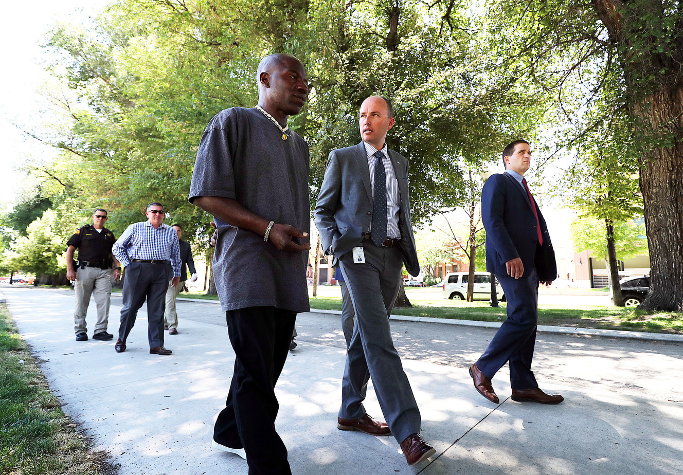Lt. Gov. Spencer Cox, second from right, talks with Kevin "Cowboy" Thrower, who is homeless, during a tour of Pioneer Park in the Rio Grande area of Salt Lake City on Monday, June 25, 2018. (Photo: Ravell Call, KSL)