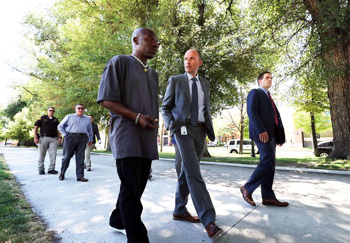 Lt. Gov. Spencer Cox, second from right, talks with Kevin "Cowboy" Thrower, who is homeless, during a tour of Pioneer Park in the Rio Grande area of Salt Lake City on Monday, June 25, 2018. (Photo: Ravell Call, KSL)