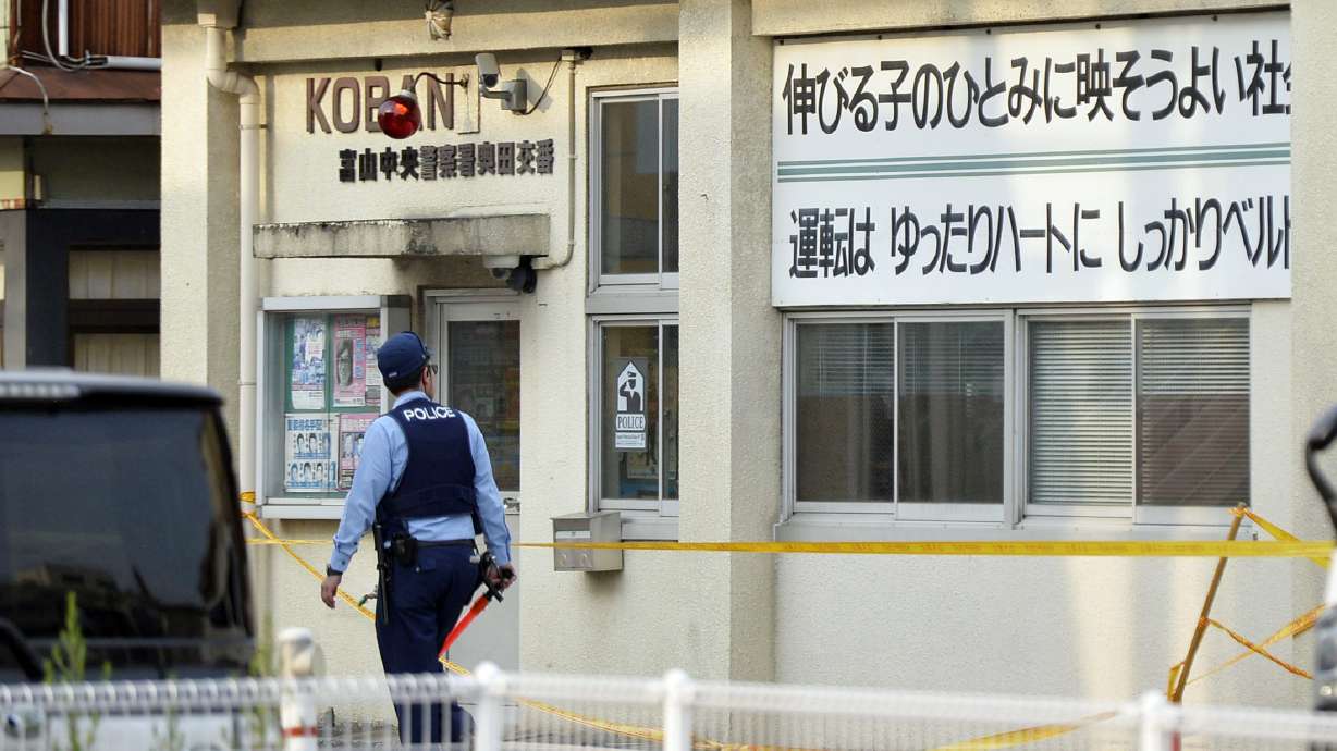 Man kills policeman, guard in attacks near school in Japan
